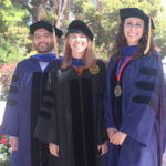 Shelley, Aleksey, and Emily adoring graduation attire.